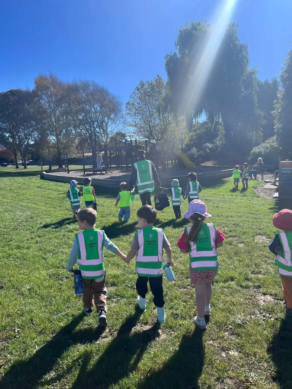 Child enjoying a creative outdoor experience at Parkside Grove